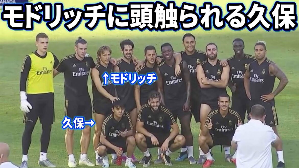 Takefusa Kubo se fait toucher la tête par Modric