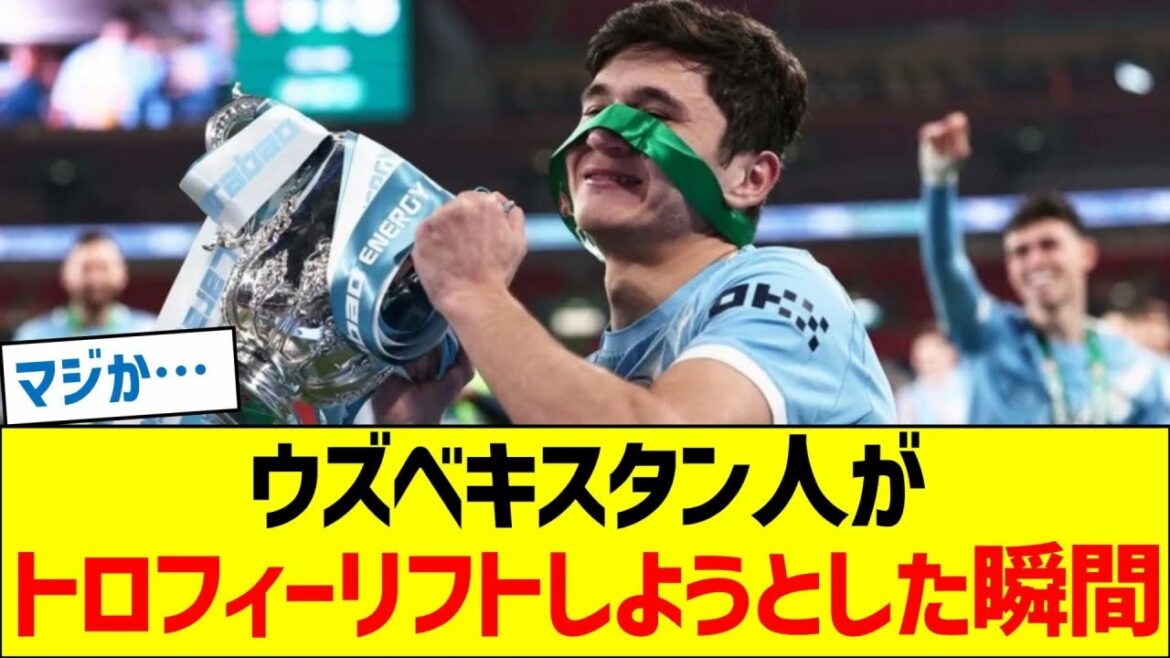 Le moment où l’Ouzbek a tenté de soulever le trophée.